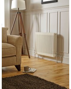 600 x 650mm 2 column horizontal radiator in gloss white - panelled sitting room with oak floor - Kartell Laser Klassic