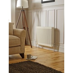 600 x 830mm 3 column horizontal radiator in gloss white - panelled sitting room with oak floor - Kartell Laser Klassic